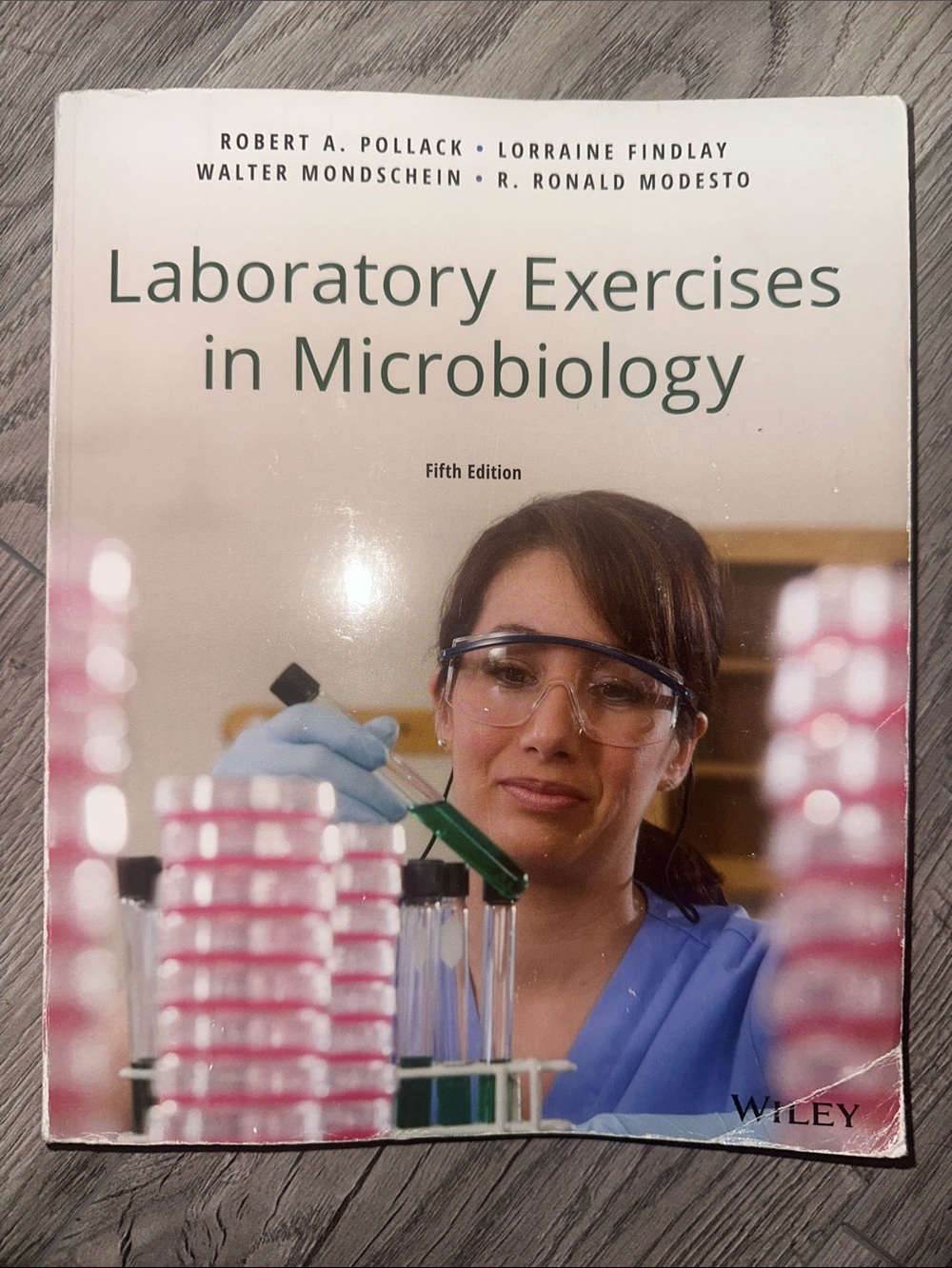 Laboratory Exercises in Microbiology Textbook - Pink & White Cover